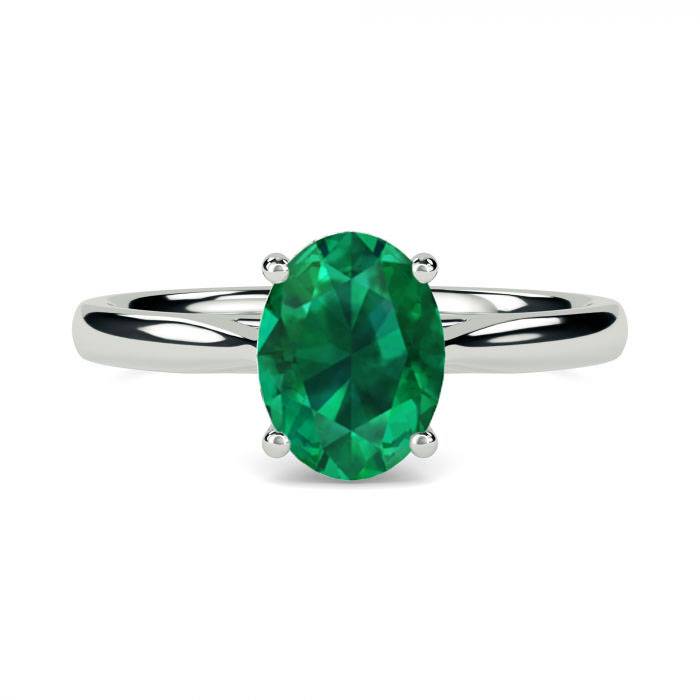 Fancy Emerald Green Oval Diamond Solitaire Ring set in Platinum